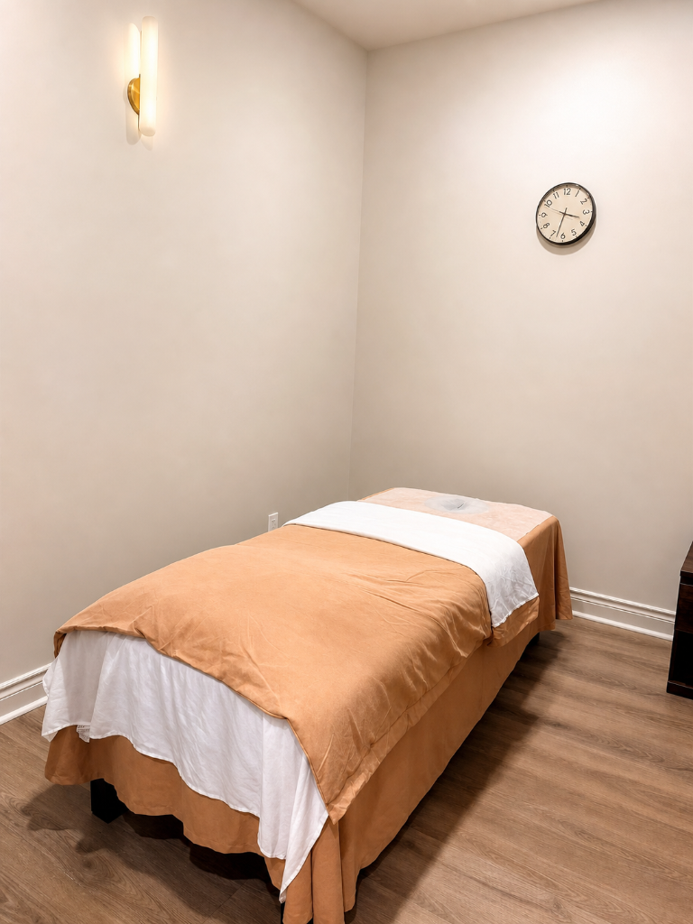 RMT treatment room with massage table at Moxa Wellness Toronto