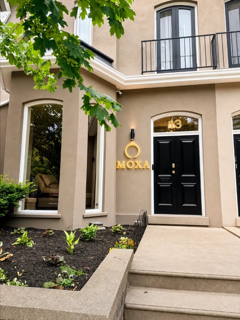 Exterior façade of MOXA Wellness at 13 Clarence Square Toronto