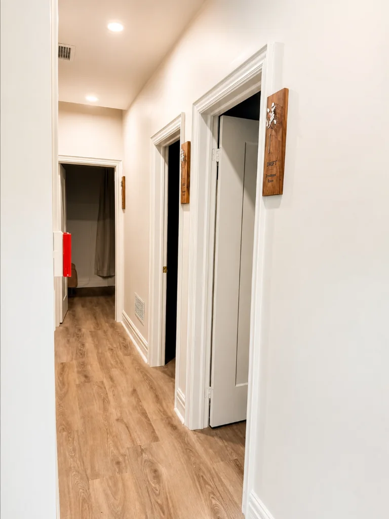 MOXA treatment-room hallway at 13 Clarence Square Toronto